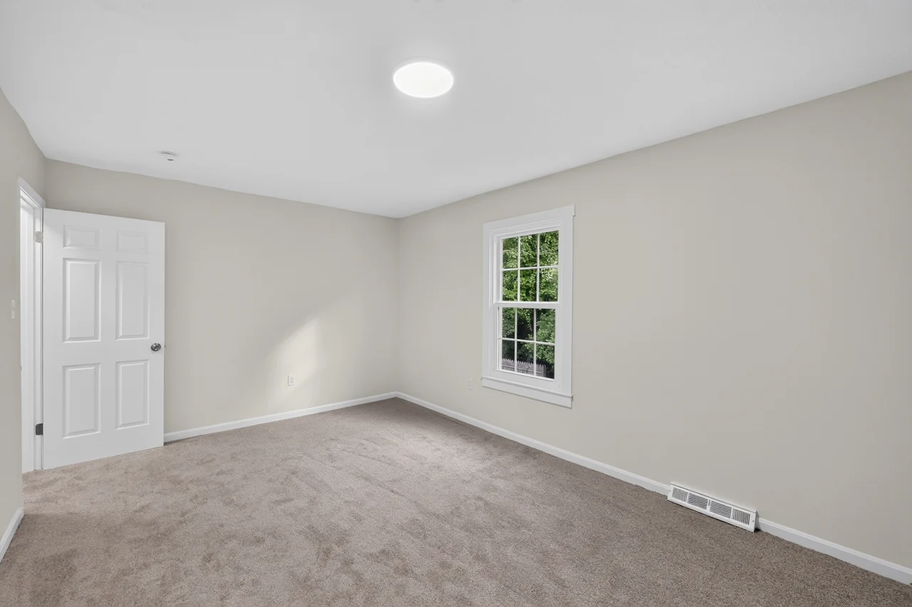 Bedroom with new carpet