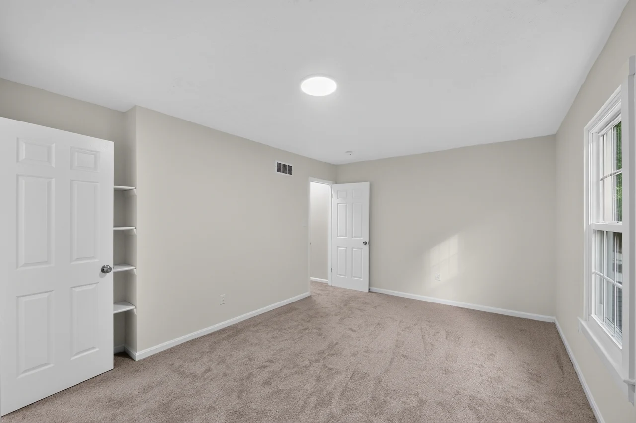 Bedroom and open closet